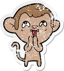 distressed sticker of a crazy cartoon monkey