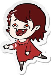 distressed sticker of a cartoon laughing vampire girl