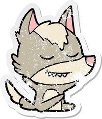distressed sticker of a friendly cartoon wolf sitting