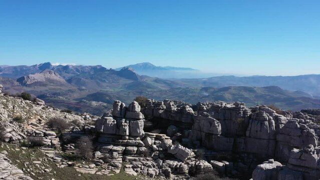 Impressive Mountain top rocks in Torcal de Antequera seen from above, aerial drone view of karstik rocks in Spain