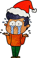 textured cartoon of a crying man wearing santa hat
