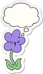 cartoon flower with happy face and thought bubble as a printed sticker