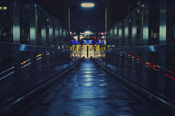 Fototapeta premium Bridge leading to the ETEC metro stop at night in Essen, Germany