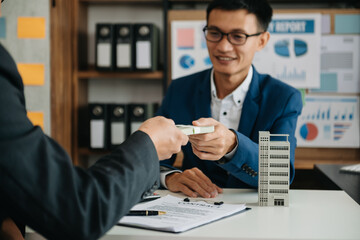 Customers who choose to buy a condominium room and a bank approve a loan for their purchase. Condominium and house loan interest rate from bank concept..