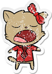 distressed sticker of a cartoon yawning cat