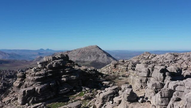 Impressive Mountain top rocks in Torcal de Antequera seen from above, aerial drone view of karstik rocks in Spain