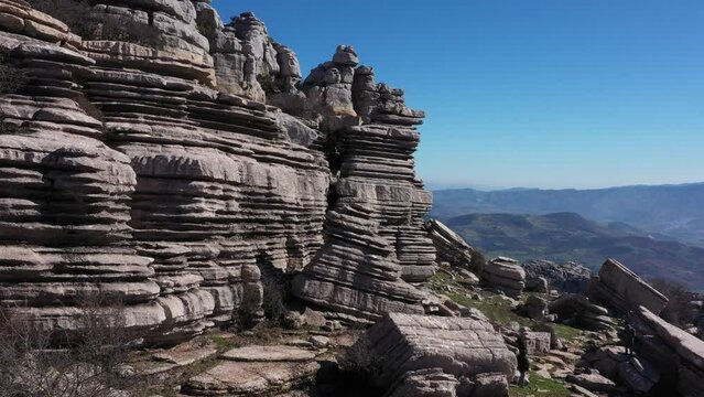 Impressive Mountain top rocks in Torcal de Antequera seen from above, aerial drone view of karstik rocks in Spain