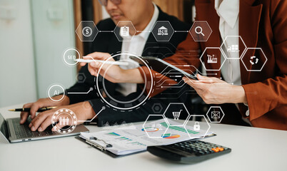 Business team present professional investor working new start up project. Digital tablet laptop computer Finance managers meeting with digital marketing media in virtual icon in morning light.