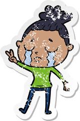 distressed sticker of a cartoon crying woman