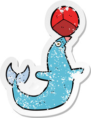 retro distressed sticker of a cartoon performing seal