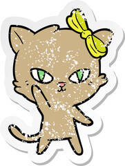 distressed sticker of a cute cartoon cat