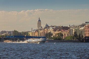 Fototapeta premium River Neva with ship meteor and St. Petersburg in summer day