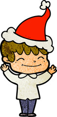 textured cartoon of a happy boy wearing santa hat
