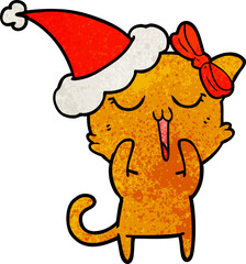 textured cartoon of a cat wearing santa hat