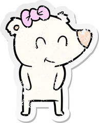 Fototapeta premium distressed sticker of a female polar bear cartoon