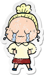 distressed sticker of a cartoon crying old lady