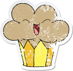 distressed sticker of a quirky hand drawn cartoon happy cupcake