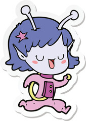 sticker of a happy alien girl cartoon