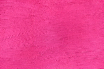 Sand Rough concrete painted magenta color, surface. Textured wall background. Building decor concept