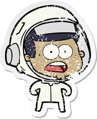 distressed sticker of a cartoon surprised astronaut
