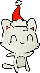 textured cartoon of a happy cat wearing santa hat