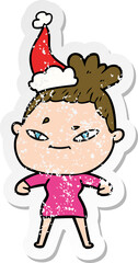 distressed sticker cartoon of a woman wearing santa hat