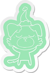 cute cartoon  sticker of a dog wearing santa hat