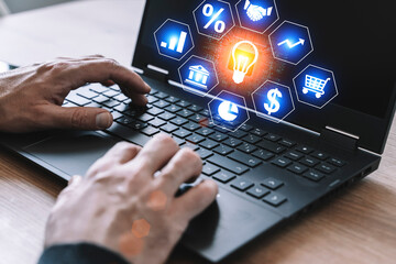 Business analytics and technology analysis concept. A manager uses a computer to analyze financial and economic affairs.