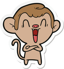 sticker of a cartoon laughing monkey