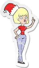 retro distressed sticker of a cartoon woman wearing christmas hat