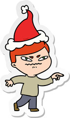 sticker cartoon of a angry man pointing wearing santa hat