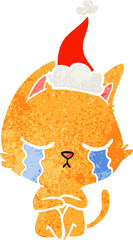 crying retro cartoon of a cat sitting wearing santa hat