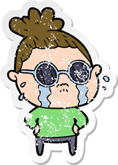distressed sticker of a cartoon crying woman wearing sunglasses