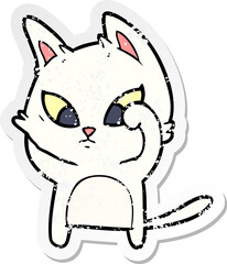 distressed sticker of a confused cartoon cat