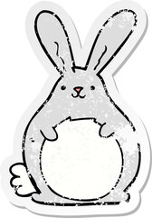 distressed sticker of a cartoon rabbit