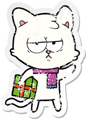 distressed sticker of a bored cartoon cat