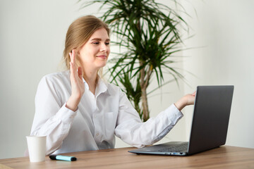 A young girl defends a business project online. Distance learning student.