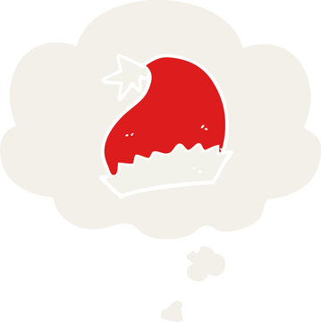 cartoon santa hat and thought bubble in retro style