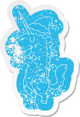 cartoon distressed sticker of a unicorn wearing santa hat