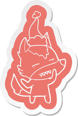 cartoon  sticker of a wolf showing teeth wearing santa hat