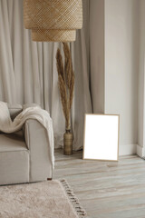 Empty white rectangle frame lifestyle mockup in neutral scandinavian interior for presentation own digital arts, paintings and photos for sell it © Julia
