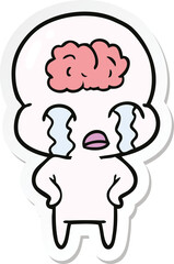 sticker of a cartoon big brain alien crying
