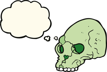 cartoon spooky skull with thought bubble