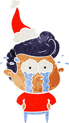 retro cartoon of a crying man wearing santa hat