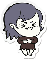 sticker of a annoyed cartoon vampire girl