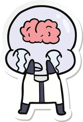 sticker of a cartoon big brain alien crying