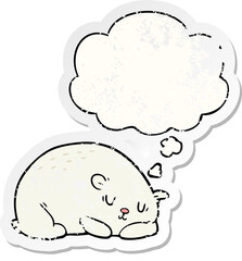 cartoon polar bear and thought bubble as a distressed worn sticker