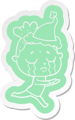 cartoon  sticker of a crying woman wearing santa hat