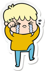 sticker of a cartoon boy crying