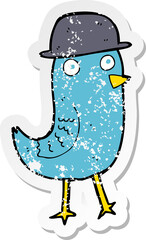 retro distressed sticker of a cartoon bluebird wearing hat